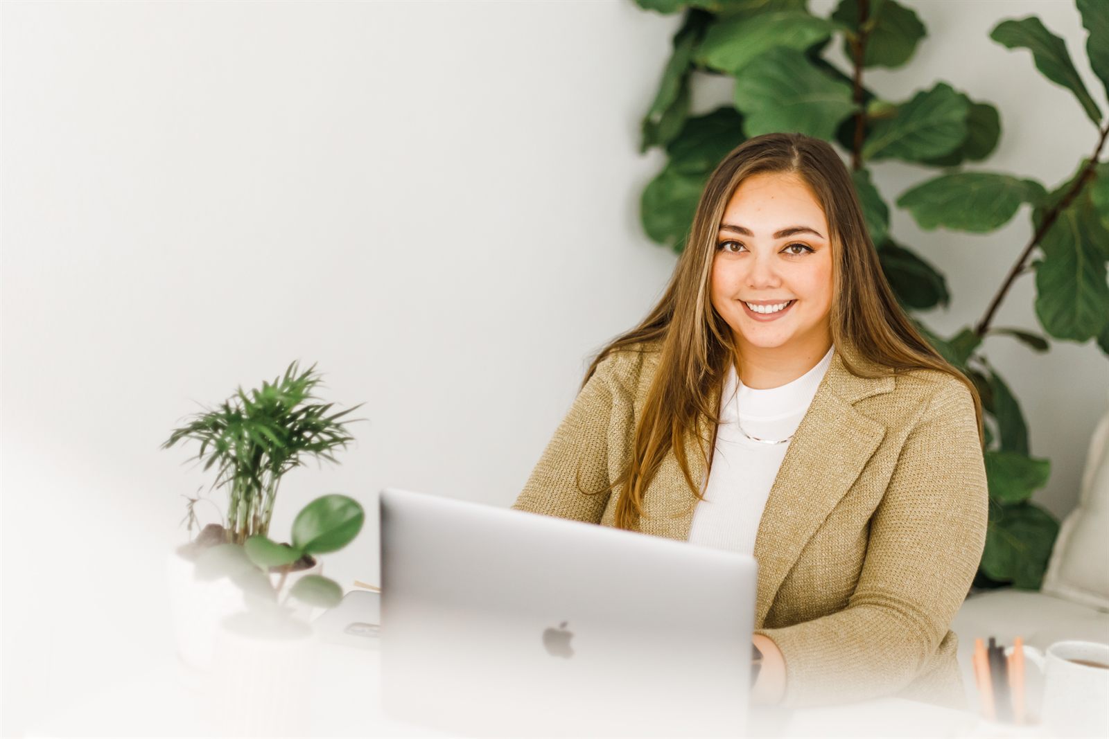 Professional headshot of Courtney Mickles, LMFT and LPCC, EMDR and Brainspotting therapist at her Roseville, California office